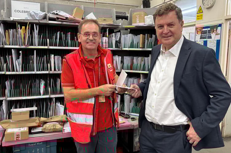 Dave Wright and Mel Stride MP at the Crediton Sorting Office. AQ 0385