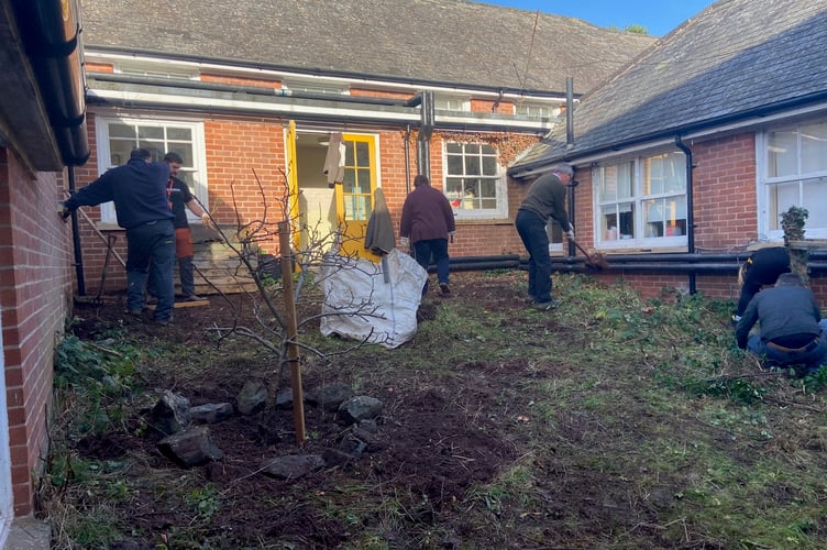 Ernest Jackson volunteers in action at QE’s Outdoor Learning and Wellbeing Project.
