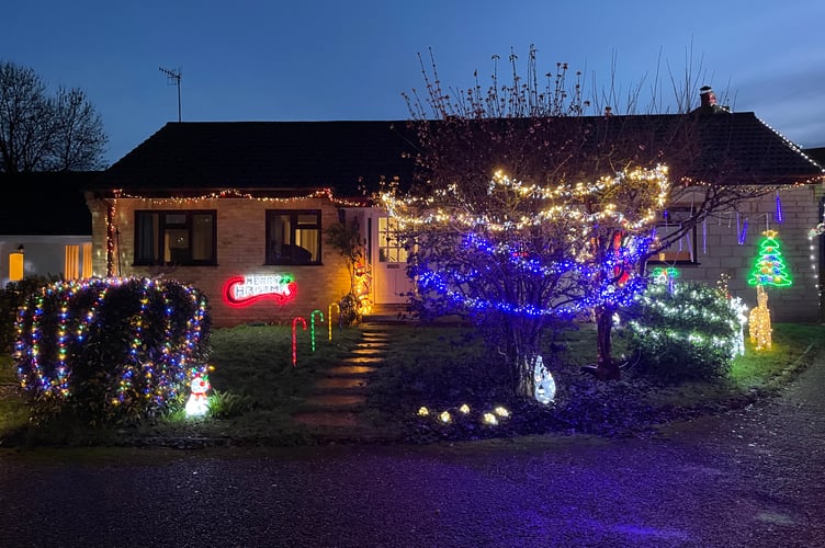 18 December 2025 Westernlea Christmas lights 6x pic special Jim Pearn of number 14 placed third (Will Goddard, Crediton Courier)