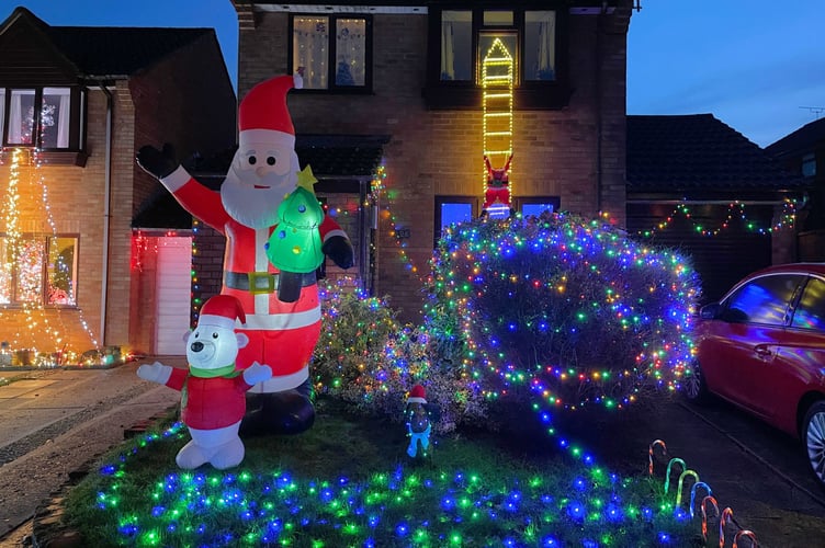 18 December 2025 Westernlea Christmas lights 6x pic special Louise Shaw of number 26 was this year's winner (Will Goddard, Crediton Courier)