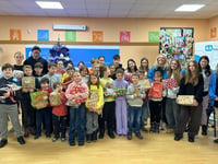 Charity barber event raises funds, collects toys for Ukraine children