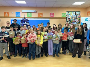 Charity barber event raises funds, collects toys for Ukraine children