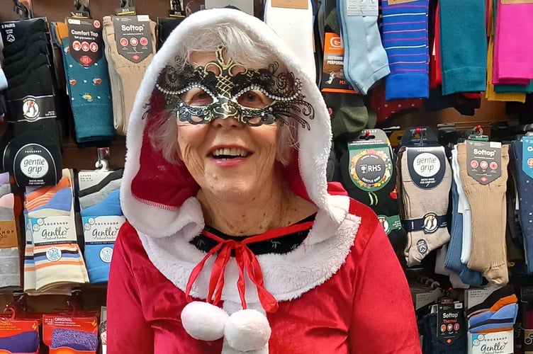 Mother Christmas during a visit to A E Lee Outfitters.  
