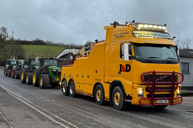 A truck and some of the tractors as they started to line up in Crediton for the charity run. AQ 0944
