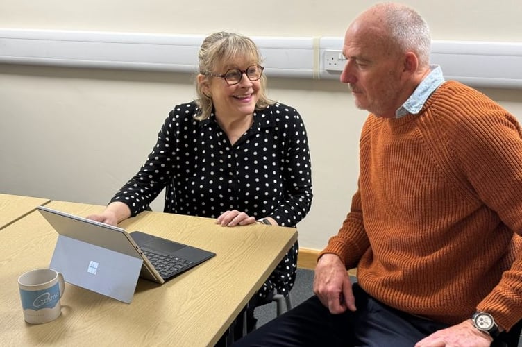 Martin Davies who has been awarded a CBE, pictured with Cosmic Chief Executive Julie Hawker.
