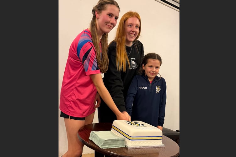 The cake cutting at the Crediton Youth FC Girls Section 10th Anniversary. 

