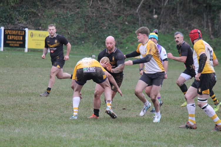 Double trouble for one of the players in black.  AQ 0871
