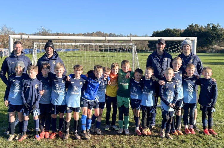 The U9 side with coaches