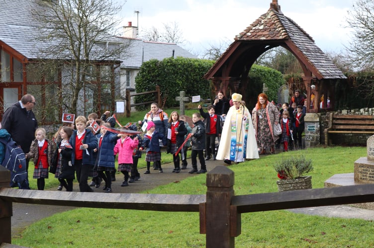 The procession leaving the church