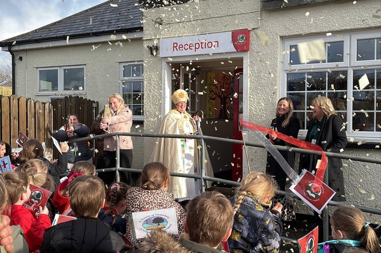 9 January 2026 Lapford school name change Bishop of Crediton Moira Astin cutting the ribbon (Will Goddard, Crediton Courier)