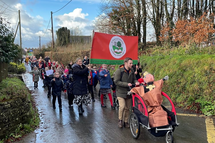 The procession heading towards the school