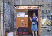 A peek behind the photobooth curtain