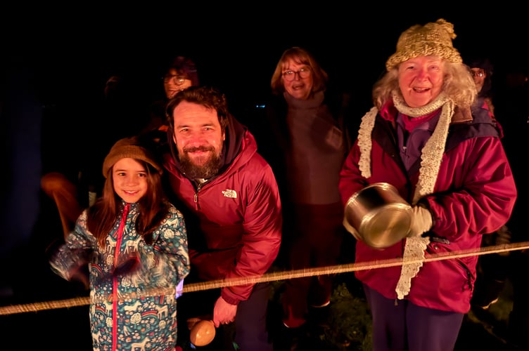 Bashing pots and pans at Sandford Wassail.  AQ 2235

