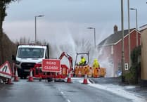 Giant water fountain from burst water main closes Crediton to Tiverton road