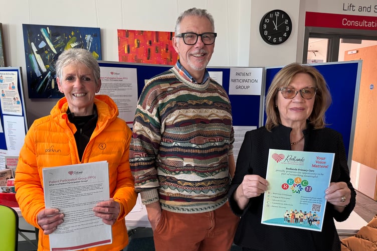 Redlands Patient Participation Group members Debbie Keast, John Downes and Barbara Clift explained what the group does to visitors.  AQ 1986
