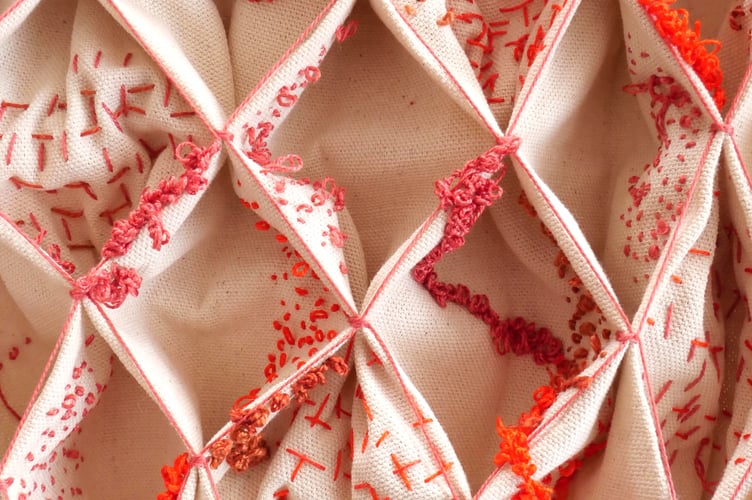 An example of smocking Honeycomb technique by Annie Coggan.
