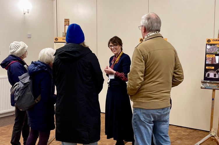 QE Headteacher Paula Smith speaking to people at one of the drop-in events at the Boniface Centre
