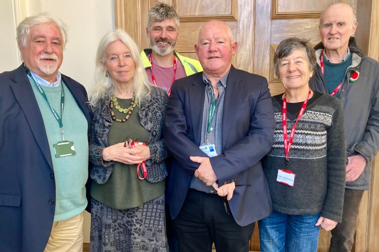 Campaigners for the Boniface Trail at County Hall, from left, County Councillors Steve Keable and Jacqui Hodgson, Crediton Town Councillor Giles Fawssett, County Councillor Jim Cairney and Laura and Gerald Conyngham of Sustainable Crediton.