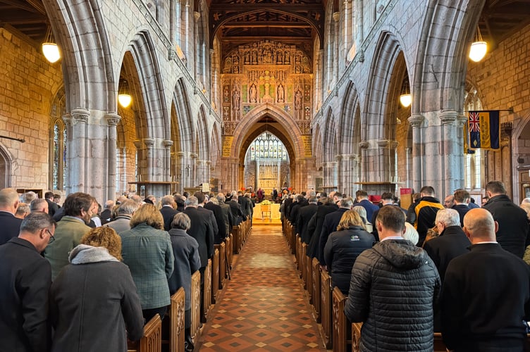 Crediton Parish Church was full for the service of celebration for Paul Harris.  AQ 2484
