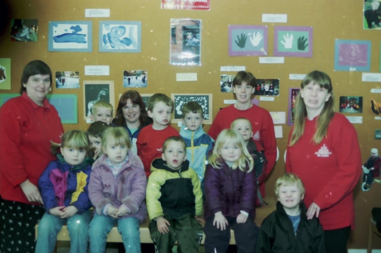 Jolly Tots Nursery enjoyed a visit to Crediton Library in April 2004. DSC00082