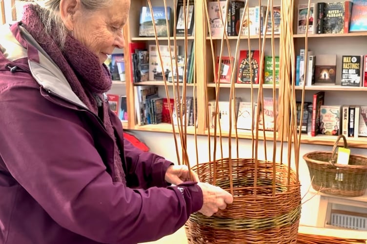 Adding willow to the Crediton Community Basket.
