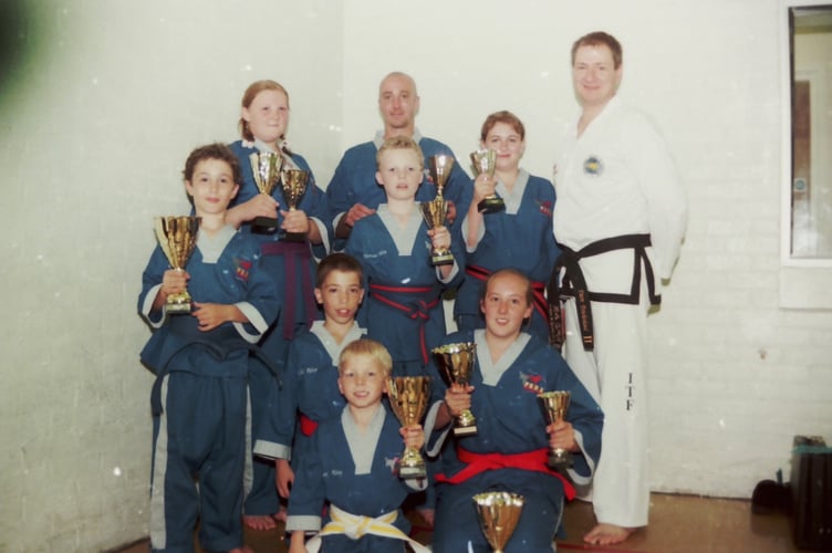 Crediton PUMA students who had success at the Tae Kwon Do Northern Open Championships, with Dave Powlesland in June 2004. DSC00746