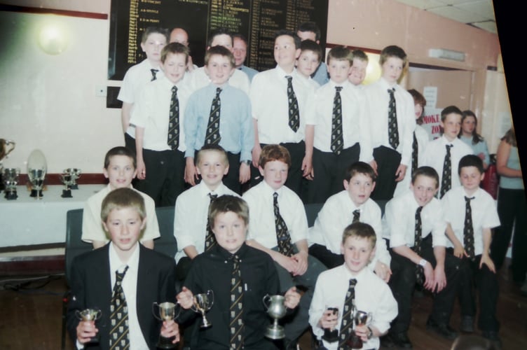 Crediton RFC Under 11s with cups in May 2004. DSC00535