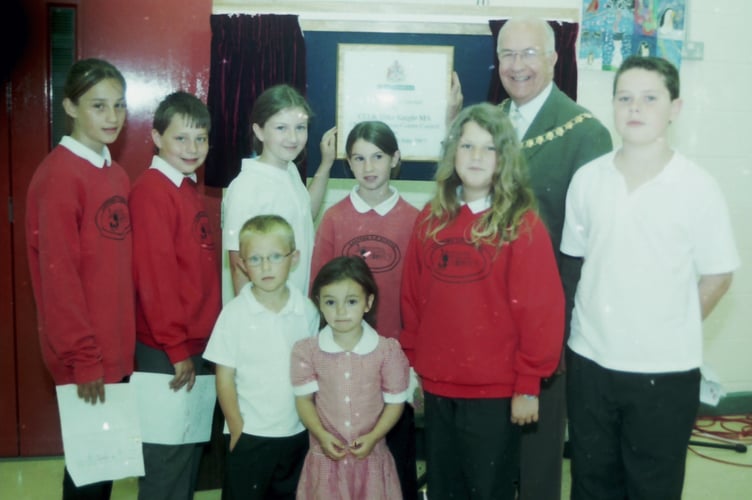 Lapford School pupils, teachers, governor and Cllr Mike Knight at the opening of a new hall at the school in June 2004. DSC00760