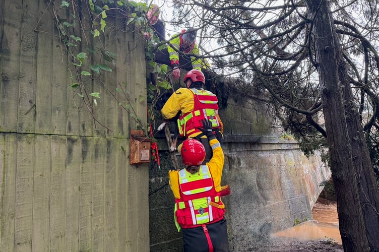 During a rescue at Ottery St Mary during Storm Chandra.
