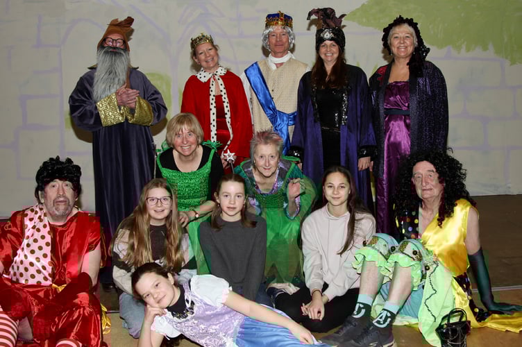 Sandford Pantomime cast, back row from left: Tim Harris, Kate Carter, Mike Snow, Mary Hewins, Jenny Start; in green: Bridgett Merrett and Sandra Ragalsky; front row: Stu Wight, Macie Carter, Molly Hockridge, Abby Hewins, Pat Laver and in the front lying down is Tabby Crocker.