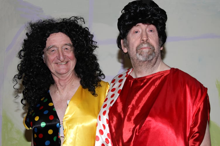 The ladies in waiting, Pat Laver as Buzzy and Stu Wight as Bizzy.