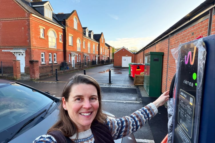 Cllr Bradshaw with one of the Tiverton Market EV Chargers.
