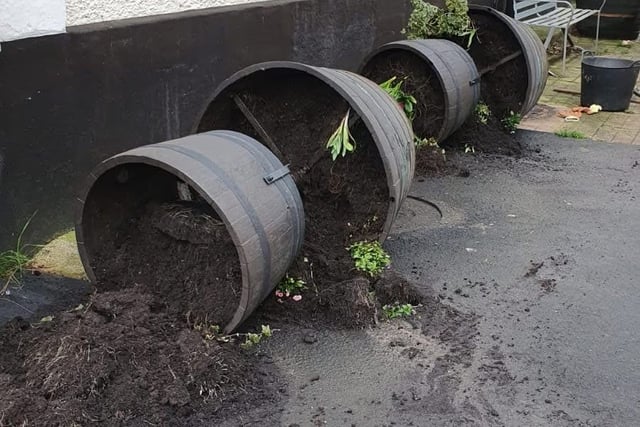 Town council condemns floral tower damage
