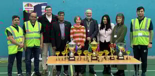 Community badminton tournament unities communities in Exeter