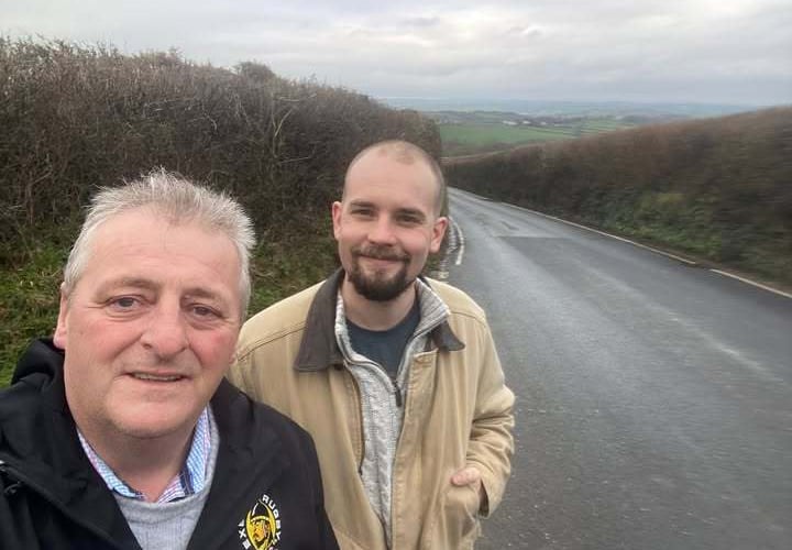 Cllrs Frank Biederman and Ed Tyldesley inspecting potholes on the B3233 from Barnstaple to Torrington.