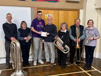 Crediton band concert proceeds donated to Hospitals Charity
