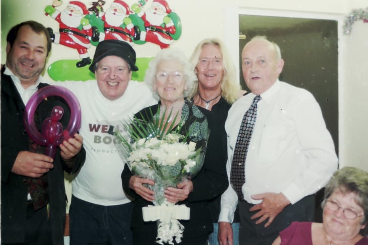 Comedian Jimmy Cricket (second left) was among the entertainment at Tedburn St Mary's annual Christmas dinner organised by Peter Bromell (right) in December 2004. DSC00093