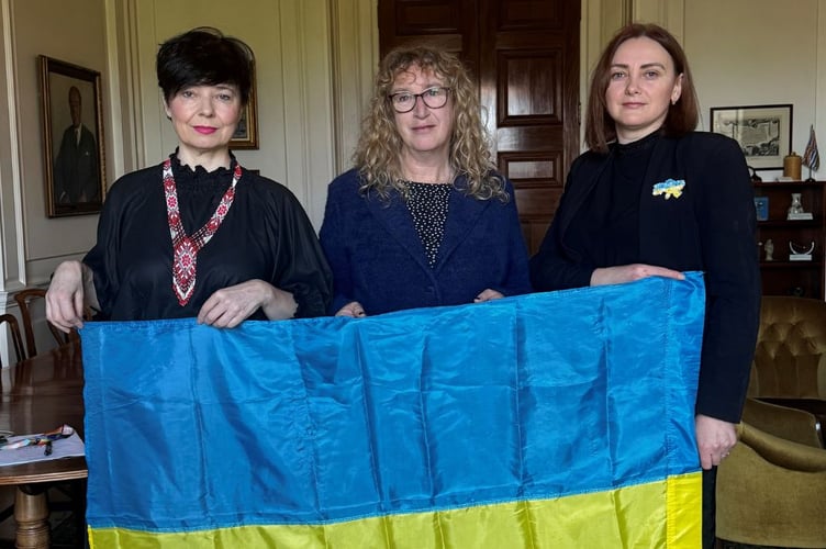 Olya and Oksana from the Devon Ukrainian Assocition, with Chair of Devon County Council, Cllr Caroline Leaver, centre.