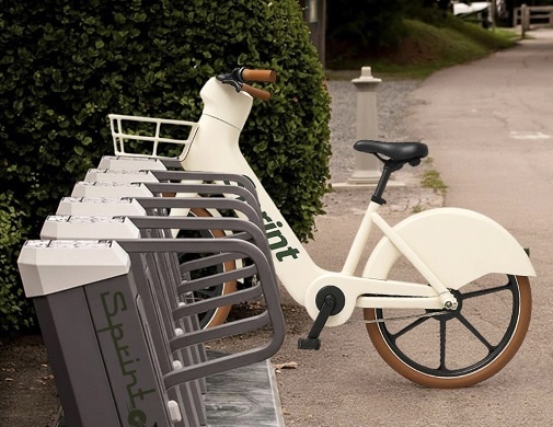 A Sprintco electric bike in a docking station