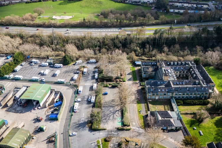 Teignbridge District Council's HQ carpark, Newton Abbot, Devon, where travellers have set up camp. March 2, 2026. // Dozens of travellers have set up an unauthorised encampment - in a council's car park. Teignbridge District Council said: "Due to an unauthorised encampment of caravans and other vehicles in Forde House car park, which arrived on Saturday, parking at the site will be severely limited this week. "Our reception will be open as usual for anyone who has an appointment with one of our services.