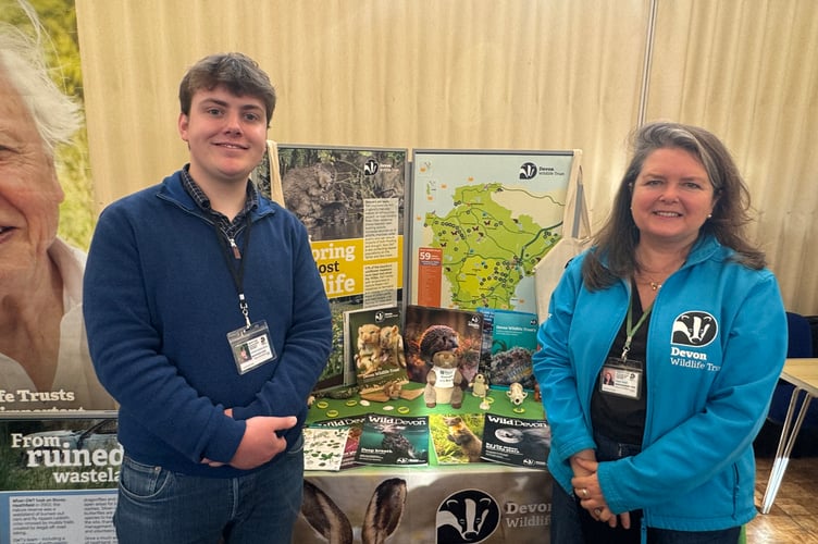 Hector Sladen-Jewell and Clare Viner ran the Devon Wildlife Trust stall.  AQ 5280
