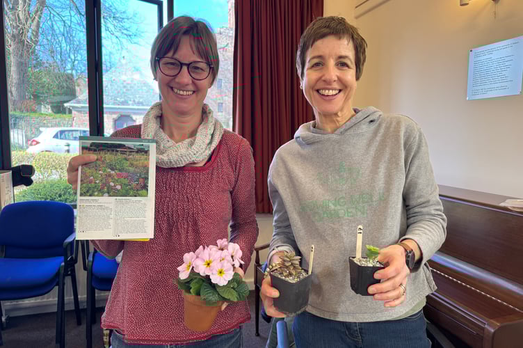 Shelly O-Berg and Susan Taheri of the Growing Well Garden had a stall at the Seed Share.  AQ 5247
