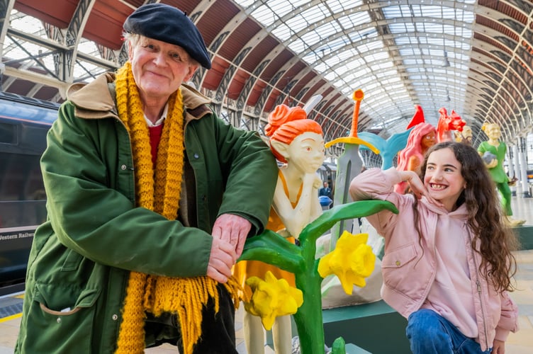 Michael Morpurgo and young rail passenger India Wiles mark World Book Day with GWR.

