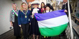 Suffragette flag raised to celebrate International Women’s Day
