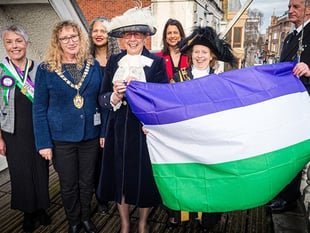 Suffragette flag raised to celebrate International Women’s Day
