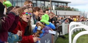 Young runners race down Exeter’s famous home straight on Family Day

