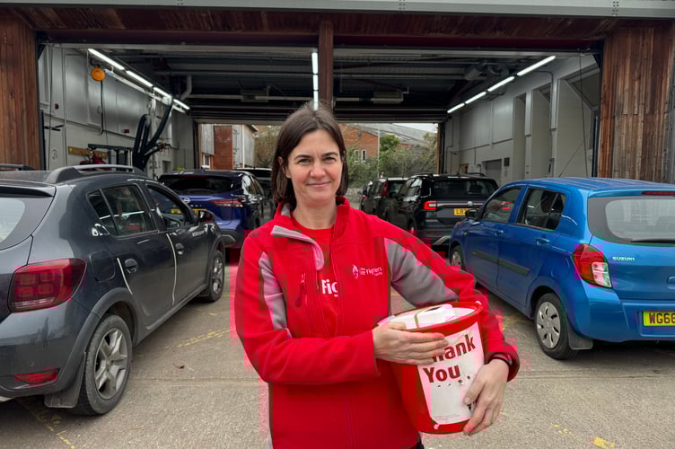 Natalie Searle from The Firefighters’ Charity helped out at the car wash.  AQ 5800
