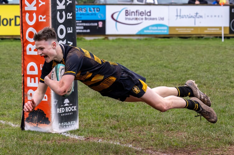 Ollie Harris all smiles scoring a try on his 1st XV debut