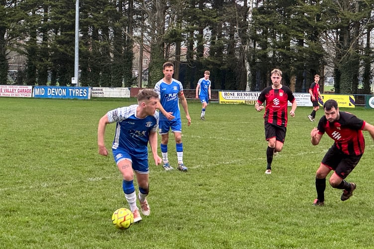 Crediton in possession with Bridport in pursuit. AQ 5867