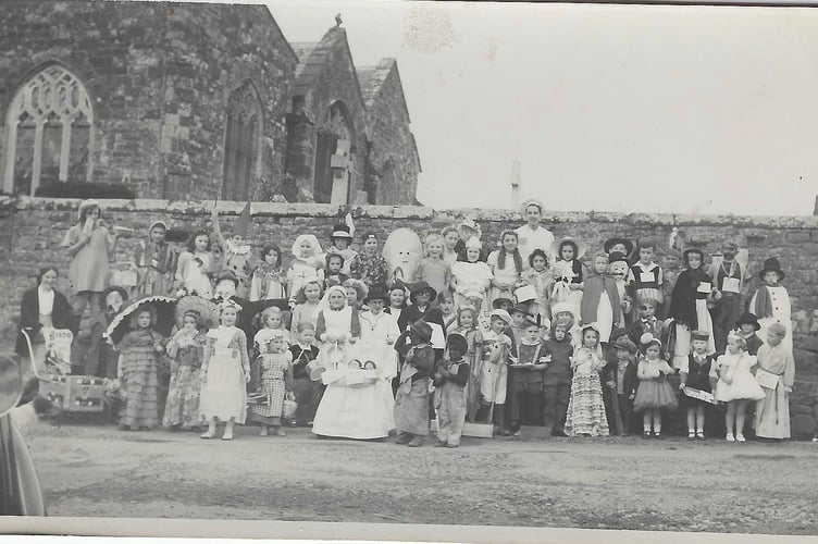 Children dressed in fancy dress at a Cheriton Fitzpaine Carnival many years ago.
